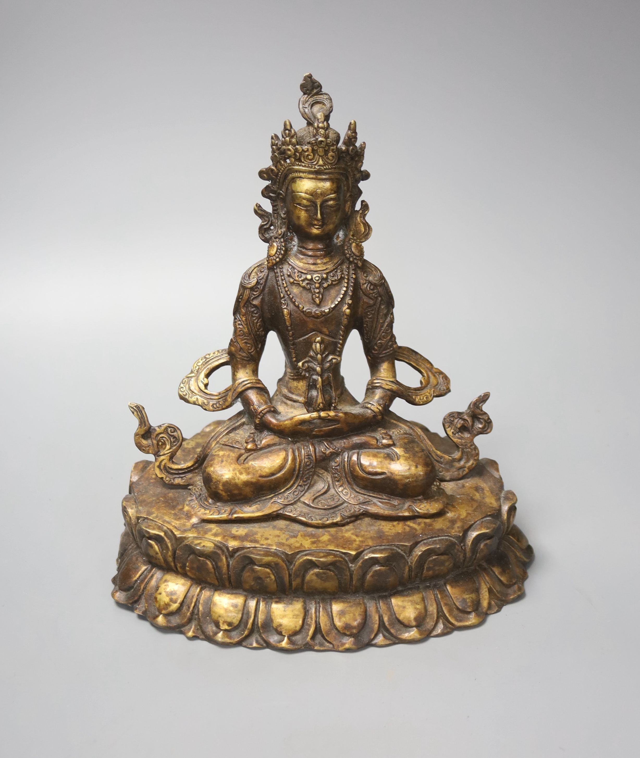 A seated bronze figure of a Bodhisattva, 20cm